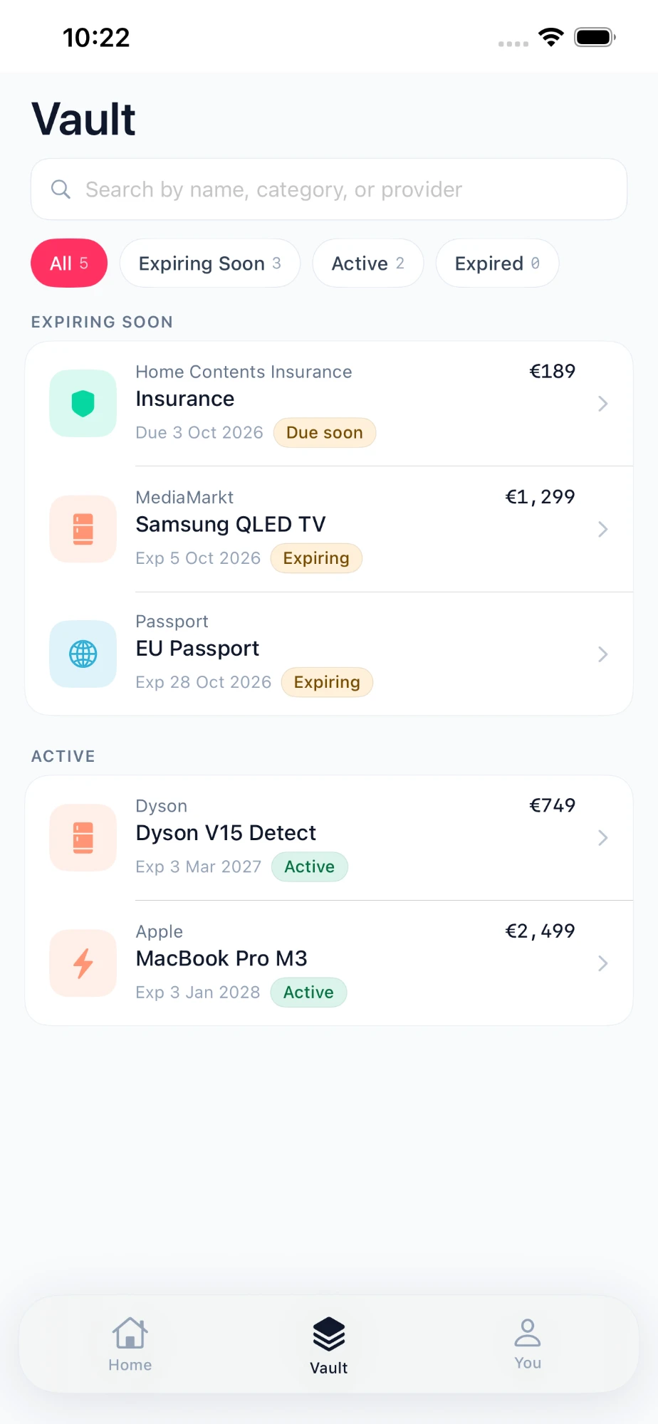 Vault screen listing insurance, electronics and a passport by status
